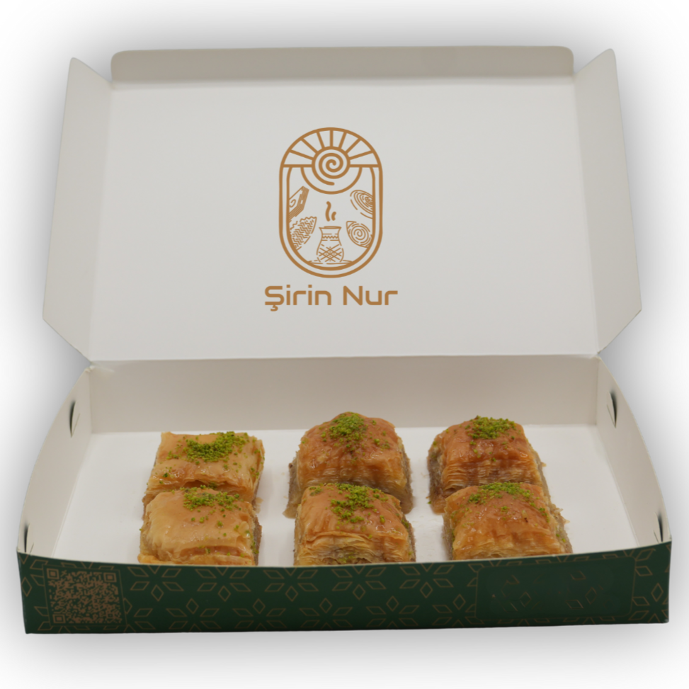 Turkish Baklava – golden, flaky layers of phyllo dough filled with finely ground pistachios and sweet syrup. A rich and crunchy classic.